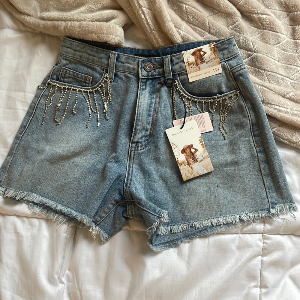 Light/medium wash Jean shorts with rime stone detail from Sincerely Jules